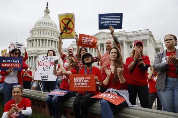 Gun co<em></em>ntrol advocacy groups rally with Democratic members of Co<em></em>ngress outside the U.S. Capitol